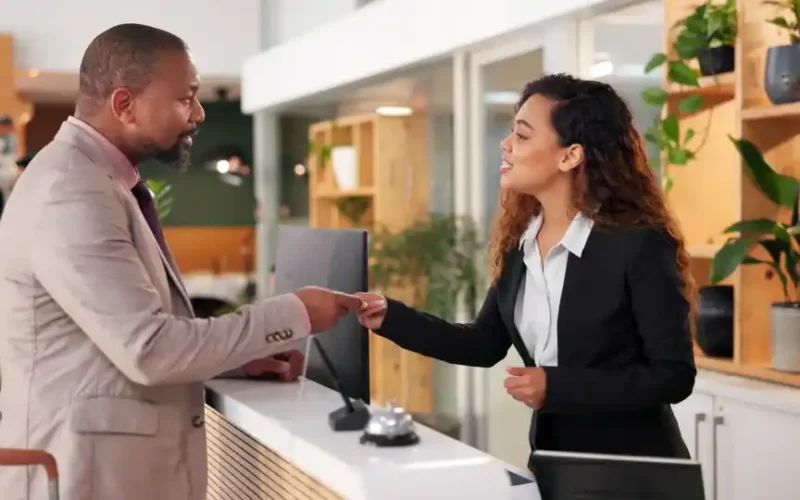 hotel-lobby-and-man-with-key-card-for-booking-gu-2025-04-06-11-13-43-utc (2)