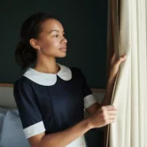 young-pretty-housemaid-in-dark-blue-dress-opening-2025-03-13-21-20-43-utc (2)